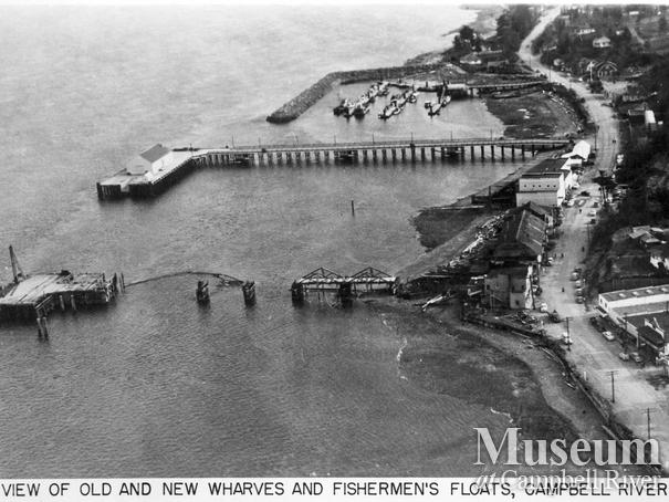 Aerial view of old and new wharves and fishermen's floats 