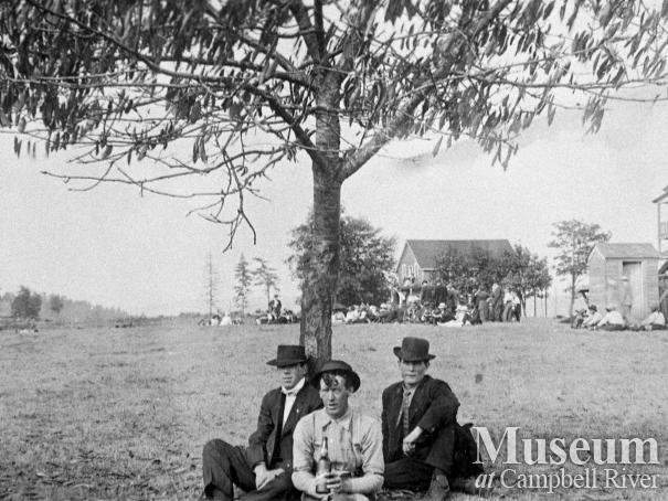 Group of loggers behind the first Willows Hotel