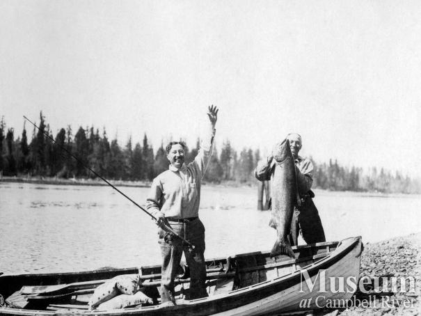 Dr. Wiborn and Herbert Pidcock fishing