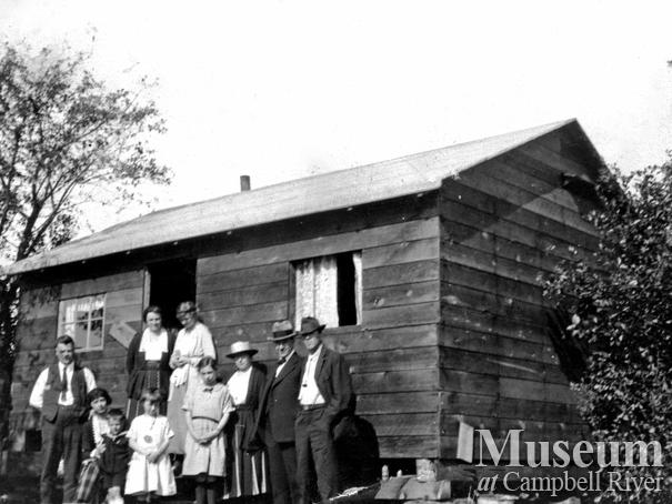 Group in front of Painter House, Tyee Spit