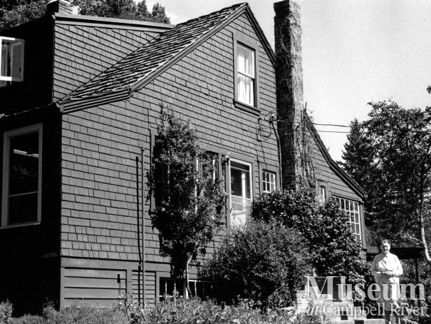 Ann Haig-Brown in front of her home 
