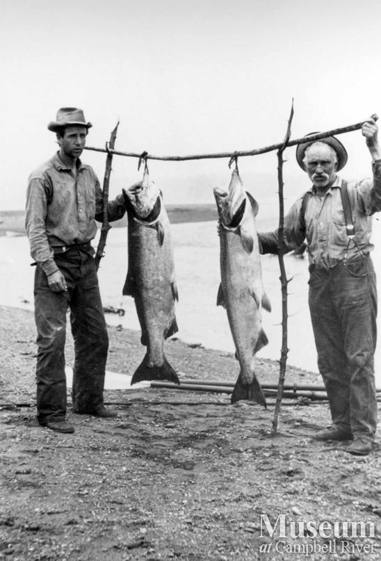 Charlie Hodak with guest and salmon
