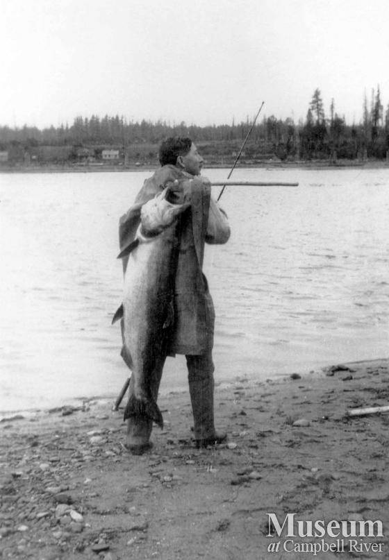Dr. Wiborn with fish on shore