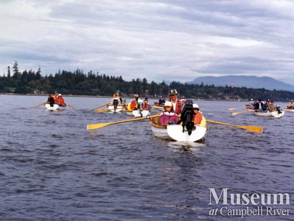 Unknown anglers in rowboats