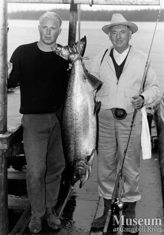 Travis Witsel with his catch, and another man