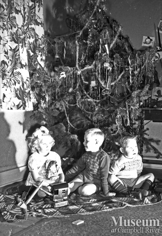Portrait of Children with Christmas Tree