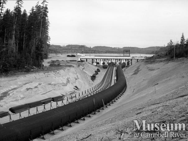 View of the wood stave penstock leading from John Hart Dam