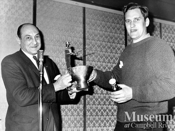 Roderick Haig-Brown presents George Raga with trophy