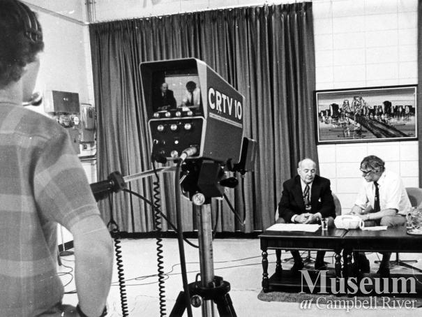 CRTV crew filming an interview at their studo